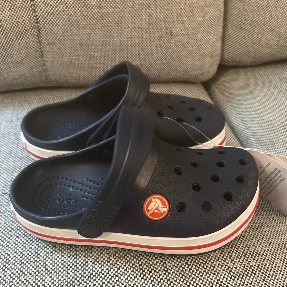 Navy blue Crocs, child size 9. NWT